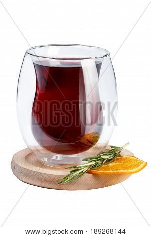 Wine In A Glass Is Not The Usual Form. Wine In A Glass On A Wooden Stand Decorated With Rosemary And