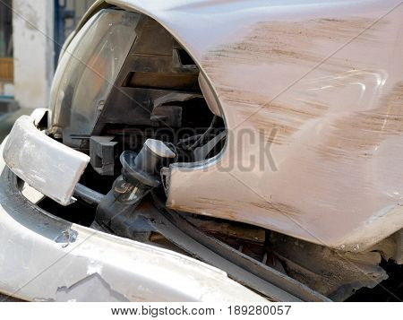 Sidelight and front bumper broken from car crash