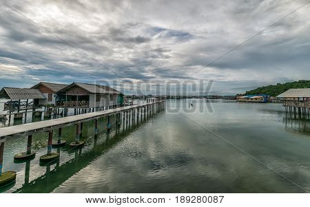 Homestay and floating basket in lake at Kohyo Songkhla Thailand with beautiful sky and clouds. This is traditional fisheries area.