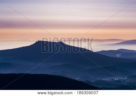 Morning foggy landscape and peak of Hvozd in northern Bohemia on aerial photography.