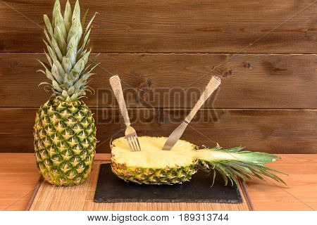 Ripe Anans On A Wooden Table And Background Texture With Free Space For Writing