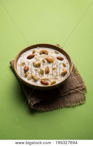 Most famous Indian sweet pudding Kheer or semiya khir in a bowl.Selective focus
