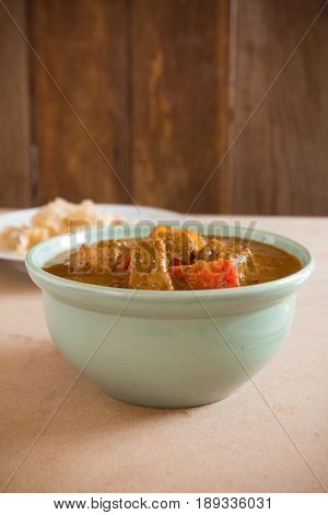 Delicious Pork Mussaman Curry On Wood Background