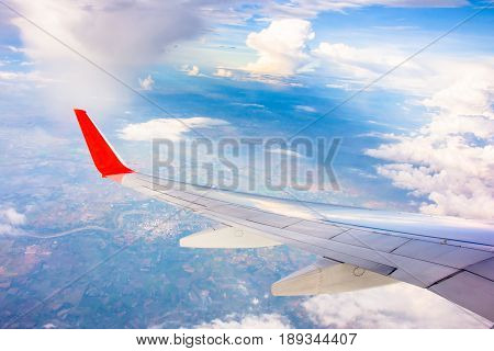 wing airplane and cloud on skyblue transportation