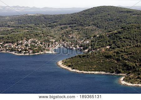 Village Sromorska on Green Island Solta in blue Adriatic sea in Croatia