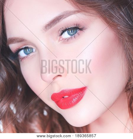 Beautiful woman skin with red lips on white background