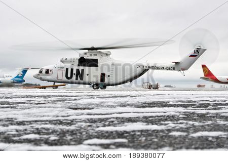 Mi-26 Helicopter In Winter In The Parking Lot Is Ready For Take-off. Russia, Surgut. November 2011.