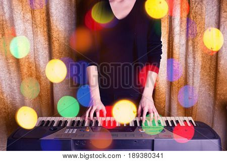 Unrecognizible Girl Musician Playing On Electronic Piano