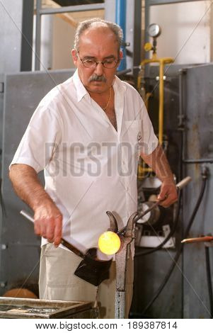 Workers During The Glass Processing