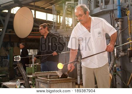 Workers During The Glass Processing
