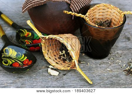 Green Tea In A Wooden Sieve, A Delicious Drink, Leaves