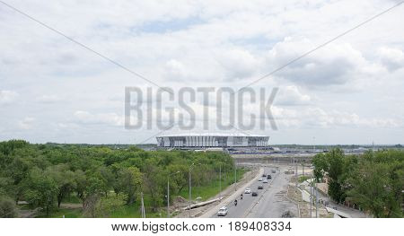 Rostov-on-DonRussia- May 282017: Construction of a new stadium for the FIFA world Cup 2018. By passing cars