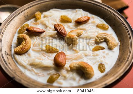 Most famous Indian sweet pudding Kheer or semiya khir in a bowl.Selective focus