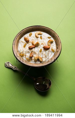 Most famous Indian sweet pudding Kheer or semiya khir in a bowl.Selective focus