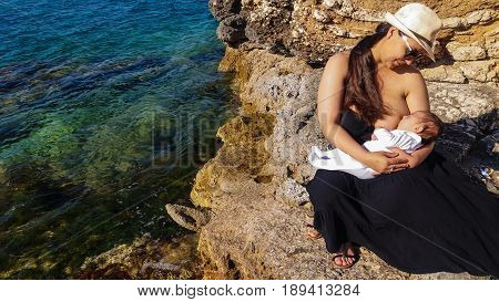 mum and baby on the beach Malta, Mellieha