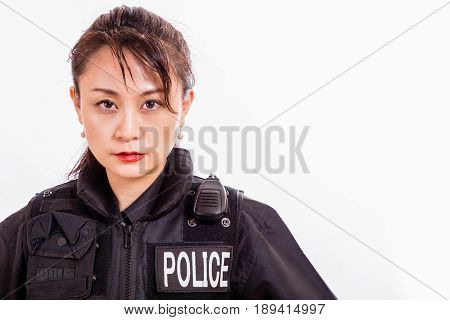 Chinese female police officer in flak jacket