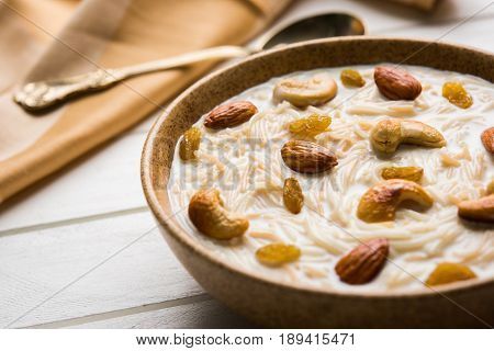 Most famous Indian sweet pudding Kheer or semiya khir in a bowl.Selective focus