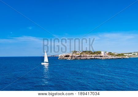 Sailboat sailing on a beautiful blue mediterranean sea