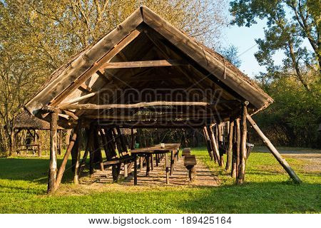 Picnic tables on a sunny morning at protected natural area of Carska bara, large natural swamp habitat for birds and other animals in north Serbia