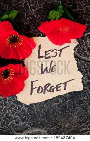 Lest We Forget - Anzac - Rememberance - poppys with written message