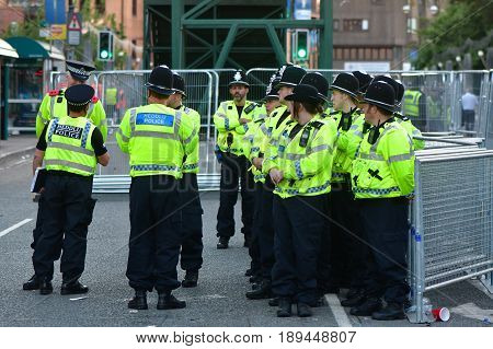 CARDIFF UK - 3 JUNE 2017 Large group of police during Champions League Final. British police and security services on high alert as hundreds of thousands of fans enjoy football in the capital of Wales