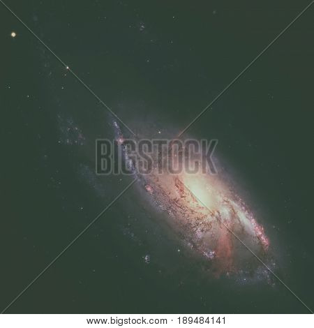 Ngc 4258 Is A Spiral Galaxy In The Constellation Canes Venatici.