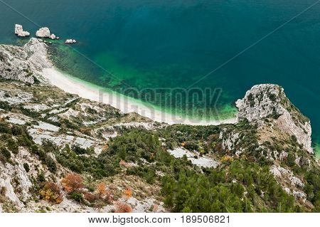 Beach of two sisters spiaggia delle due sorelle seen from the wolfs step in the park of Mount Conero Italy