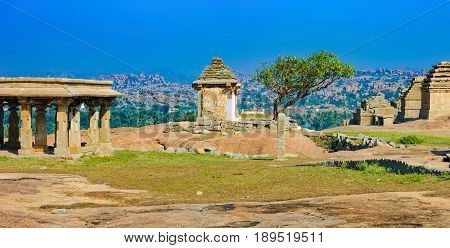 View from Hemakuta hill sunset point with ancient ruins Hampi, Karnataka, India. Landscape with unique mountain formation with amazing stones tropical nature and temple. UNESCO World Heritage Site