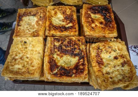 Close up of murtabak at food bazaar.A popular street food in Malaysia that's friggin' sinful.