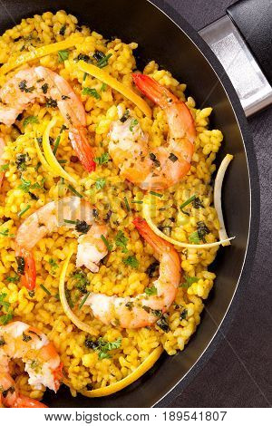 Delicious paella in pan from above. Seafood.