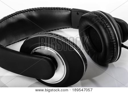 Black headphones isolated on a white background