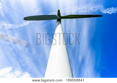 Day view wind power turbines generate electricity.