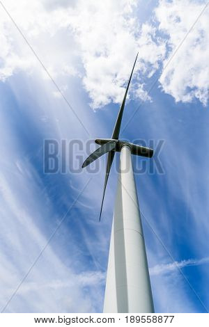 Day view wind power turbines generate electricity.