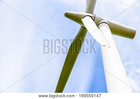 Day view wind power turbines generate electricity.