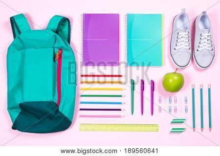 Flat Lay With Various School Supplies On Colorful Surface