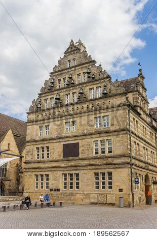HAMELN, GERMANY - MAY 22, 2017: Historic house Hochzeitshaus at the central market square of Hameln, Germany