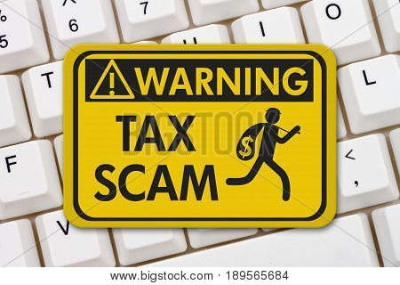 Tax scam warning sign A yellow warning sign with text Tax Scam and theft icon on a keyboard 3D Illustration