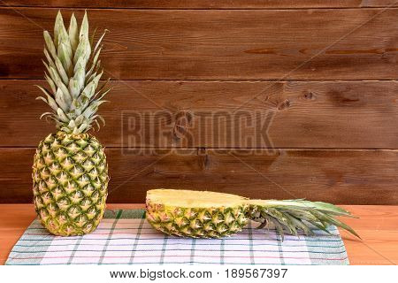 Ripe Anans On A Wooden Table And Background Texture With Free Space For Writing