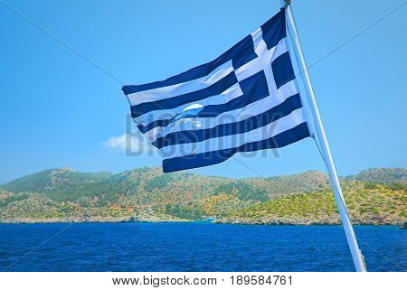Greece flag consists of colors blue and white straps and white cross - symbol of blue sea and white sea scum or sky. Greece national flag. Greek flag. Greece holidays vacations tours