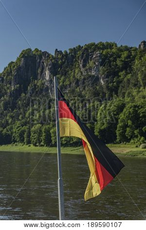 Germany Flag On Ferry Boat In Kurort Rathen Town