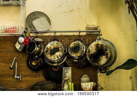 old vintage utensils handging on the wall photo taken in depok bogor indonesia java