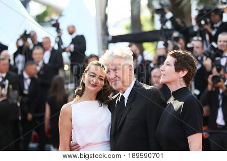 Emily Stofle, director David Lynch and producer Sabrina S. Sutherland  attend the Closing Ceremony during the 70th annual Cannes Festival at Palais des Festivals on May 28, 2017 in Cannes, France.