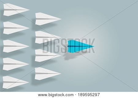 Leadership and ambition concept with blue paper plane that become a leader