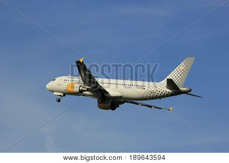 Amsterdam the Netherlands - June 2nd 2017: EC-KLT Vueling Airbus A320-200 taking off from Polderbaan Runway Amsterdam Airport Schiphol