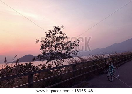 Mint Green Retro Bicycle, Mountain, Lake And Gradient Sky