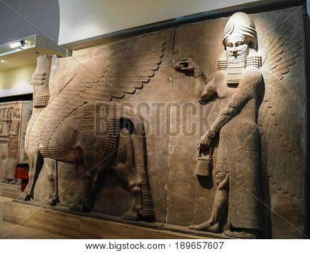Bas of human-headed winged bull statues aka lamassu in Baghdad, Iraq