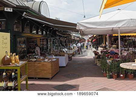VIENNA, AUSTRIA-JUNE 01, 2017: People enjoy the Naschmarkt in Vienna, Austria