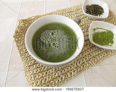 Cup of sencha green tea with matcha