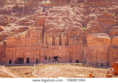 PETRA, JORDAN. May 1, 2014. The Burial complex in Petra that consists of the Palace tomb, Corinthian tomb, silk tomb, urn tomb (left to right). The ancient Nabataean city of Petra.
