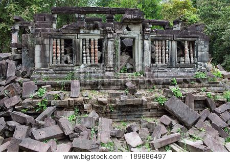 Ruins of ancient Beng Mealea Temple over jungle in Cambodia. Beng Mealea (early 12th century) is a temple located 40 km east of the main group of temples at Angkor, its name means 